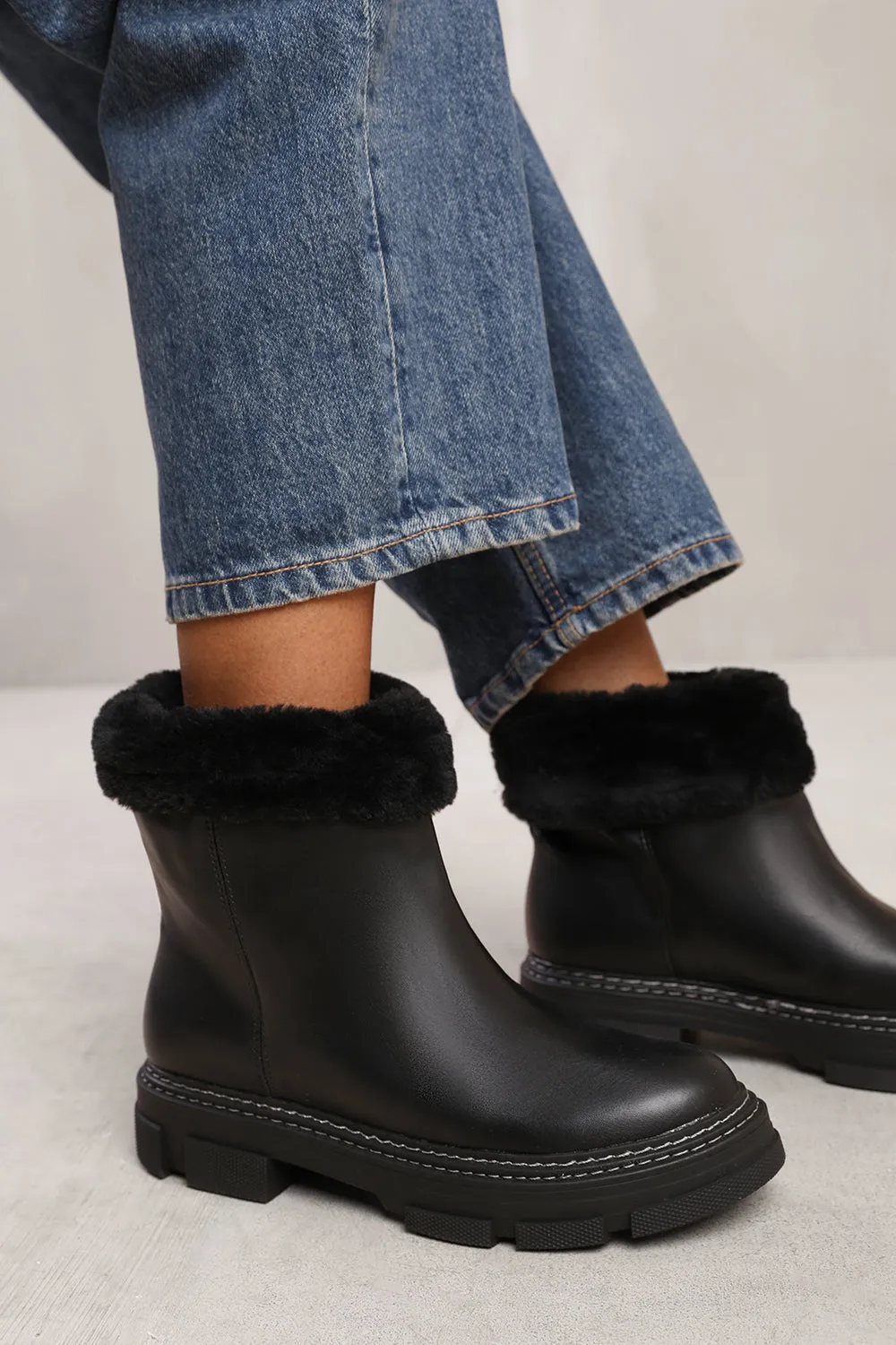 PEYTON ANKLE BOOT WITH FUR LINING IN BLACK FAUX LEATHER